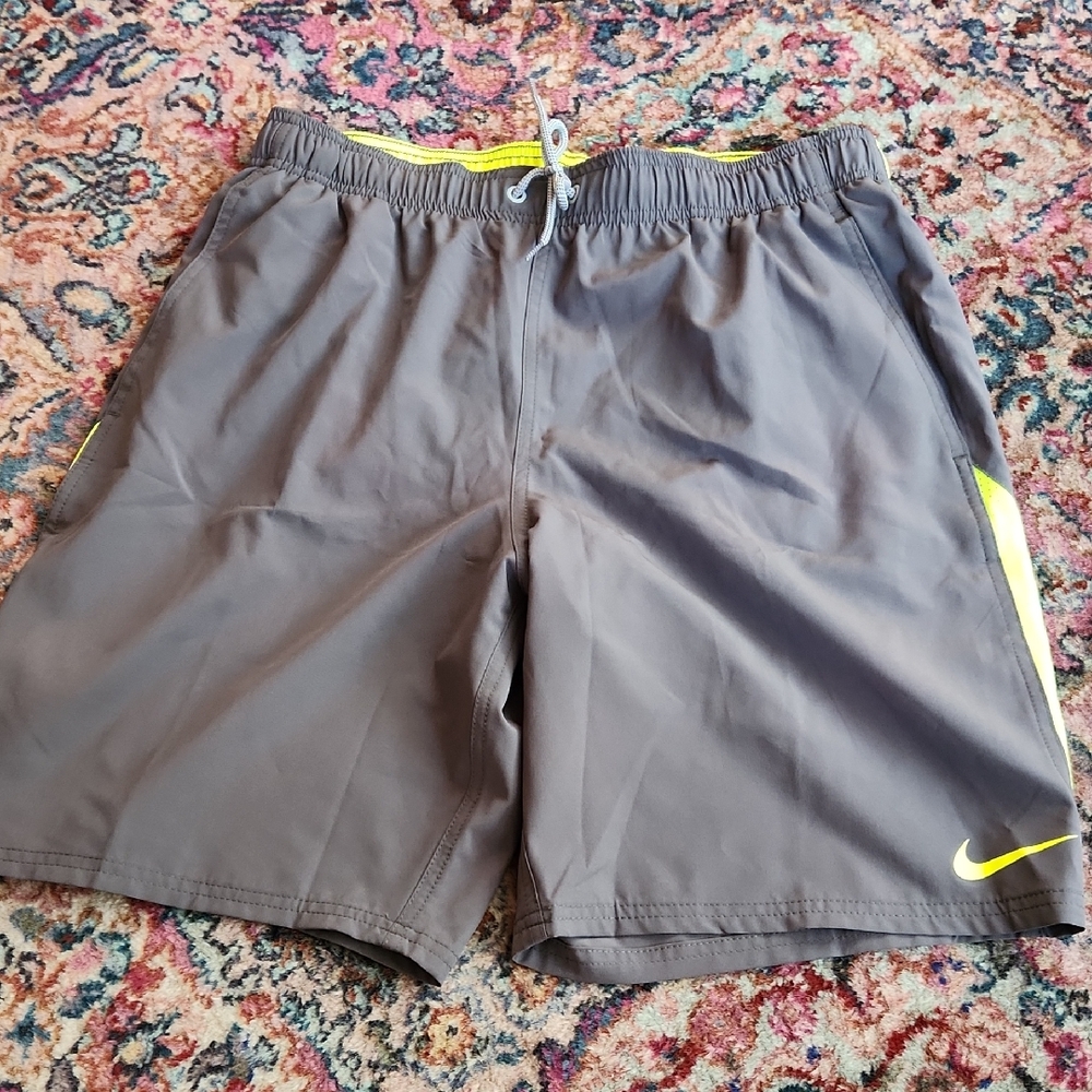 Nike Mesh Lined Swim Trunks with Neon Yellow Details.